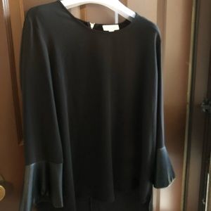 Calvin Klein leather bell cuffs. Exposed zipper on back.  Never worn